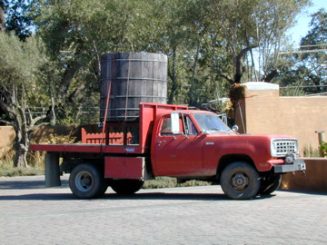 The tank arrives on a hudson farm truck